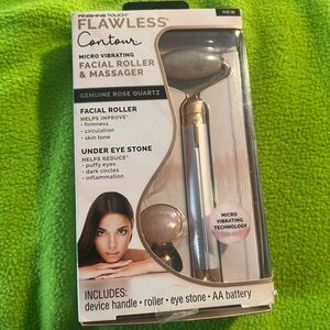 Never used finishing touch electronic interchangeable facial massager.